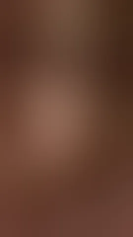 Hot brunette with big boobs stroking a big dildo