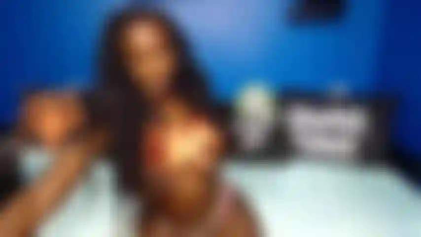 Orange top titty tease.