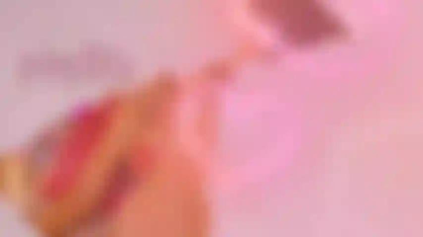 Bare legs, red toenails tease