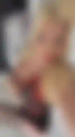 Hot MILF Barbi Bentley play with herself in red and black lingerie.