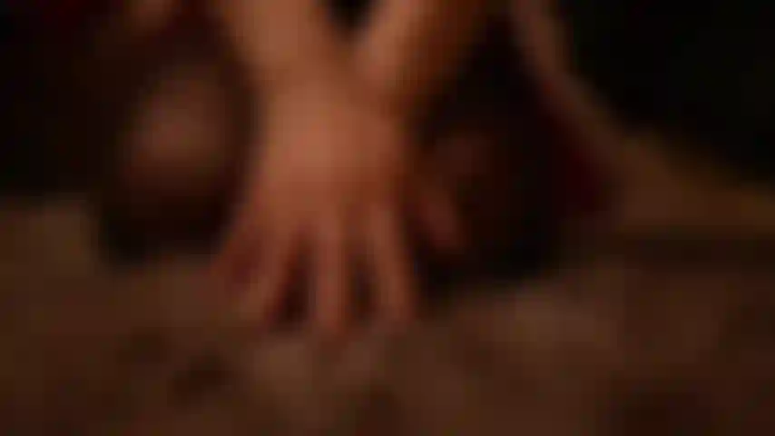 The scene burns silently under the Christmas lights.