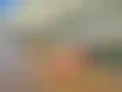 Je me détends nu à la plage.