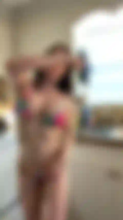 Bikini tease.