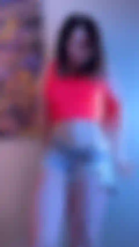 Jouissant avec mon vibromasseur, debout.