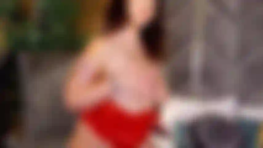 Topless and red string.
