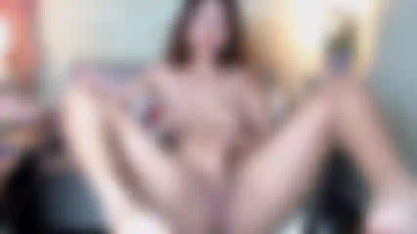 Spreading legs and masturbating