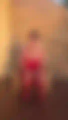 Red lingerie, heels, fishnets, bent over waiting for you to slide in