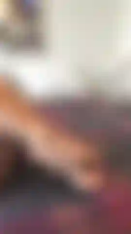 Feet Tease  A warm, intimate tease focused on my feet - red nails, soft skin, and the gentle motion of one foot caressing the other.