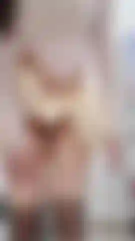 wearing knee high fishnet stockings and short skirt showing off full butt