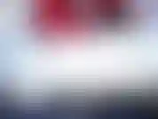 Des vacances en bottes sexy rouges.