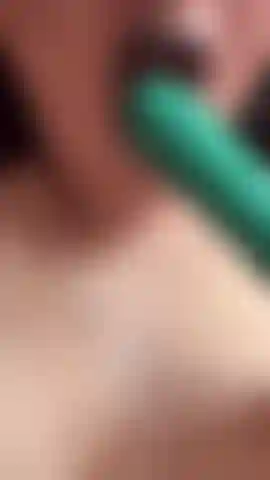 Video of me in black lingerie and goth makeup using my green toy