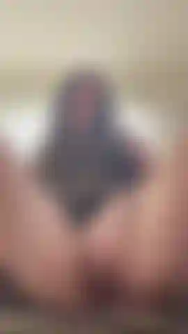 Rubbing my pussy up close in a brown and black dress