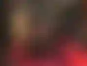 J'adore le cuir - bottes hautes chaudes, collants noirs, mini-cuir court et veste avec gants.