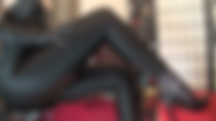 Legs in shiny black lycra leggings, feet in black leather pumps and reinforced pantyhose - Admire Mistress' thighs and legs clad in glossy spandex and nylon feet in sexy stilettos.