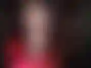 Superposition de collants, fétichisme des pieds – collants blancs brillants sur fond noir. C'est un mélange de couleurs très sexy.