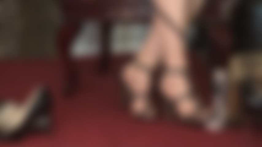 Cock and balls are stimulated by Mistress' riding crop and strappy sandals - Mistress has you exactly where she wants you, at her feet, your slave cock jumping at the mere sight of her pantyhose-clad feet in stilettos.