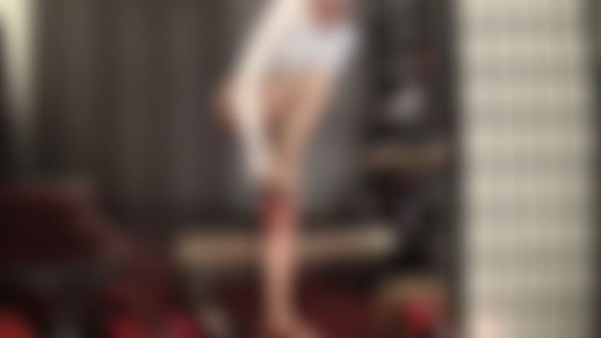 Mistress dressed in lingerie, stockings, garters owns your throat with her big strap-on.