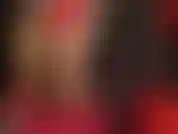 Une déesse du latex brillant et du nylon.