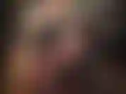 Corset en cuir, short moulant, collants brillants et bottes en cuir - la maîtresse est si belle dans cette tenue, mettant en valeur ses courbes parfaites.