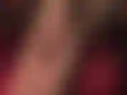 Enfilant des collants noirs transparents et un pantalon noir, taquinant en gros plan avec des semelles et des orteils en nylon doux et sexy.