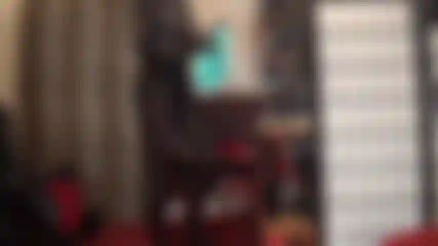 Une allumeuse de culotte sexy avec une variété de sous-vêtements en satin brillants et colorés combinés avec un body fétiche en pvc et des collants wolford noirs opaques.