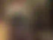 Vêtue d'un corset en cuir noir sexy, de gants et de collants, ma maîtresse enfile un de ses petits godes-ceintures, caressant et poussant cette grosse bite. Oh, n'aimerais-tu pas être du côté des receveurs !