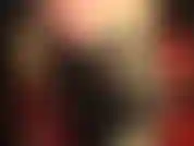 Des bottes hautes à lacets, des collants brillants et brillants de couleur beige foncé, des shorts sexy et chauds.