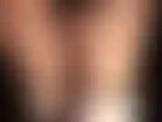 Short en satin noir sexy, collants brillants et bottes en satin.