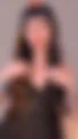 black babydoll dress  playing with my long hair  stare into my bright blue eyes  perfect pouty lips and a flirty smile