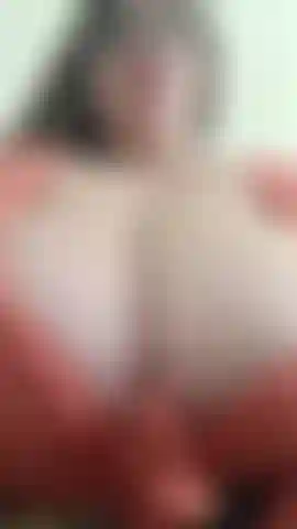 tease u with my deep cleavage and orange shirt