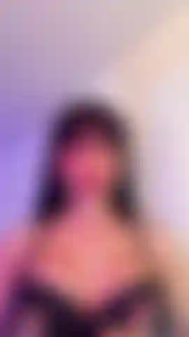 Des seins sexy dans l'huile
