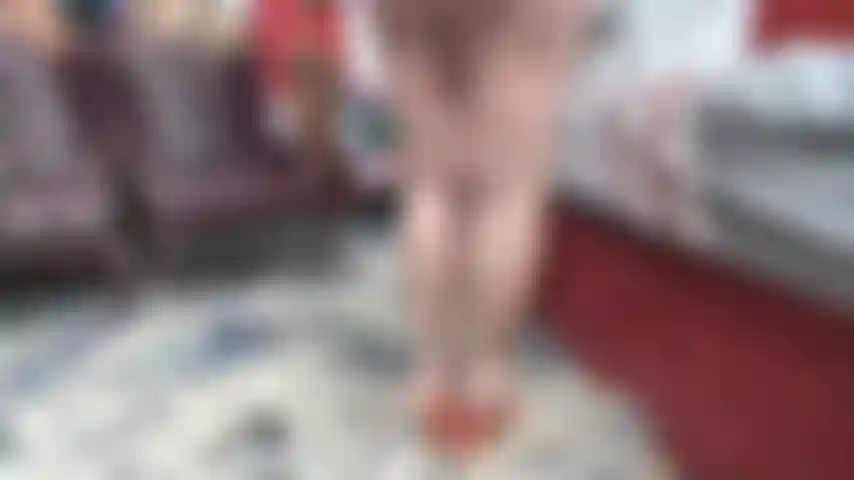 NONE NUDE---STANDING IN ORANGE MULES STEPPING ON SMALL WHITE TOY--SCOLDING YOU FOR STAIRING AT MY GILF FEET