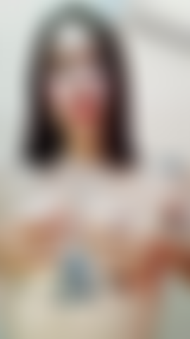 Un massage dans mes seins.