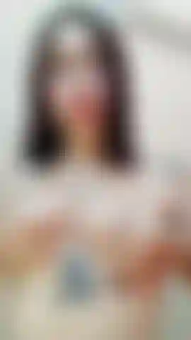 Un massage dans mes seins.