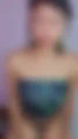 Sexy girl puts on her pants in front of the camera