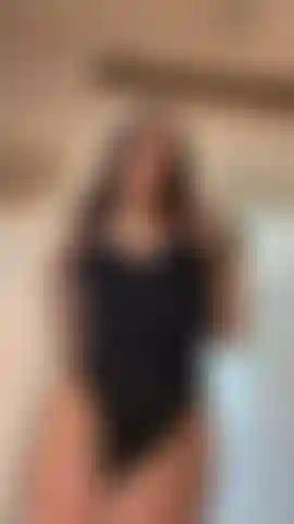 Sexy black bodysuit hugging all my curves in the right places