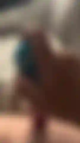 Playing with my shaved pussy on the sofa. I really hope I dont get caught